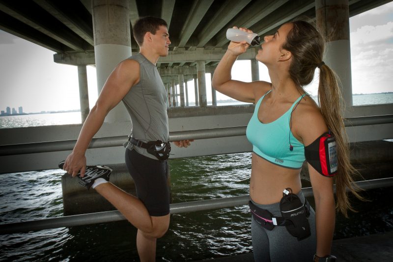 running belt vs handheld bottle vs armband side-by-side comparison